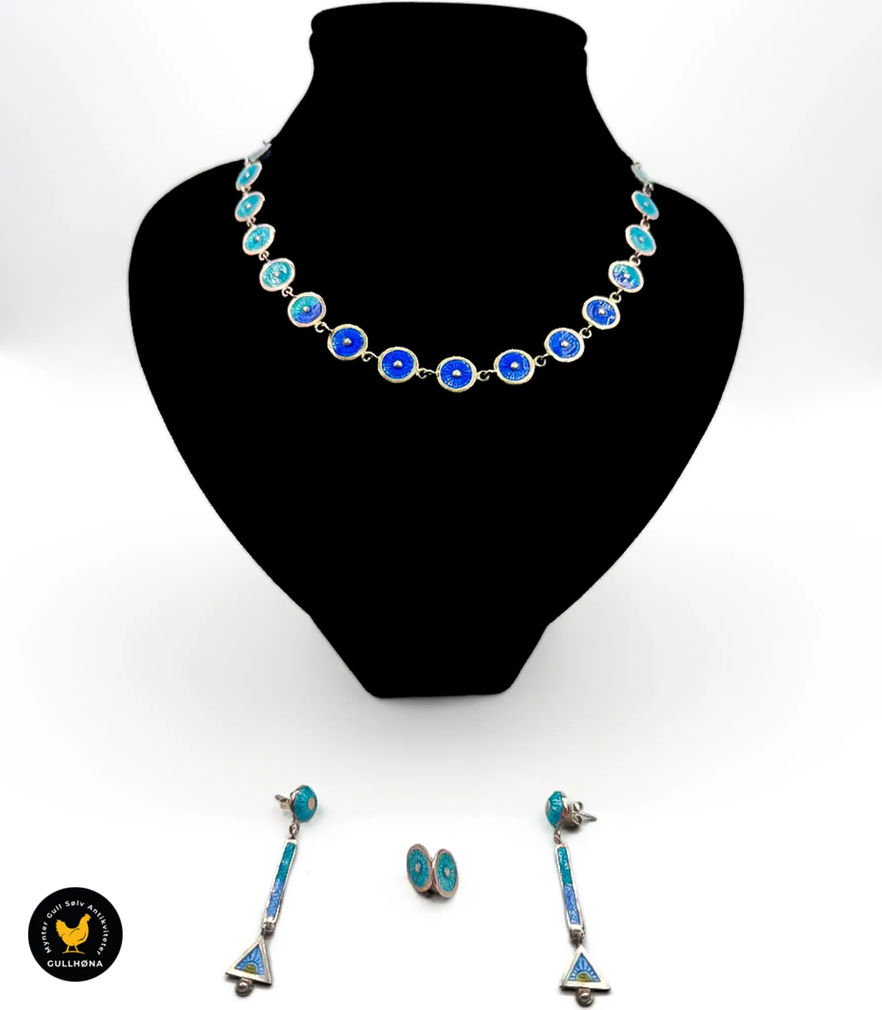 Blått sett ørepynt og smykke 1