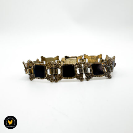 Armbånd i forgylt sølv med svart emalje